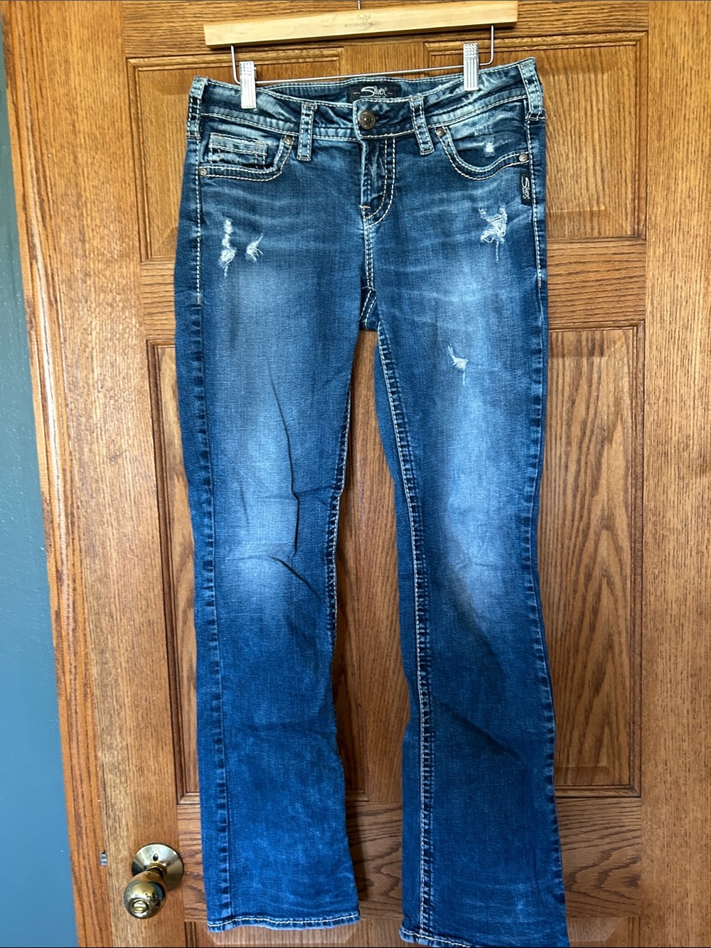 Women’s Distressed Dark Blue Bootcut Jeans